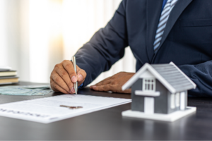 Residential property contract and pen on a table, ready for signing